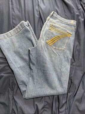 7 For All Mankind Light Blue Flared Jeans with Yellow Back Stitching